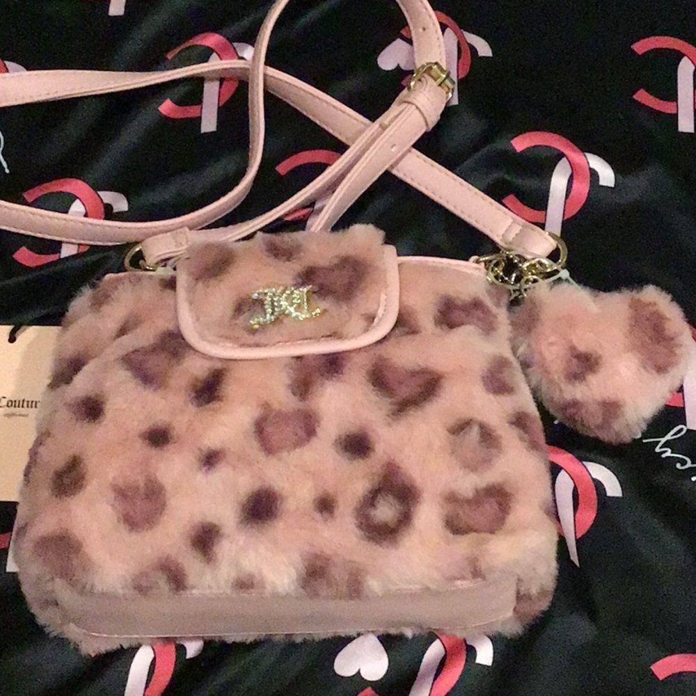 Juicy Couture Pink Furry Leopard crossbody bag with mini heart fur charm.